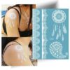 Tatouage attrape rêve en dentelle