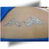 Tatouage paillette ailes d'ange