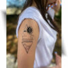 Tatouage vague soleil