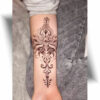Tatouage orchidée avant bras