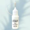 Flacon de colle cosmétique 10 ml, conçue pour créer des tatouages temporaires et des bijoux de peau. Hypoallergénique, sans latex et facile à utiliser.
