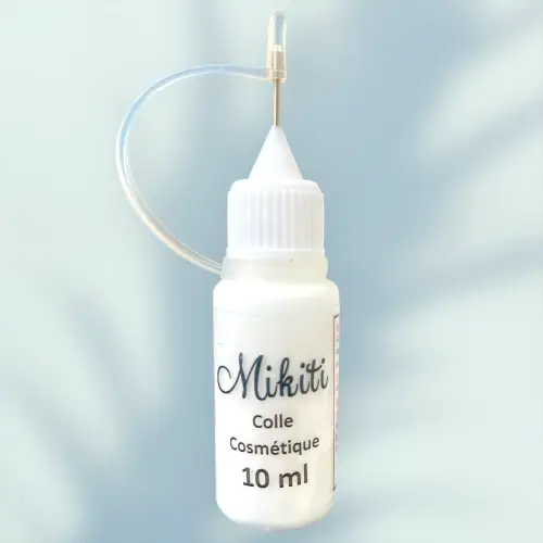 Flacon de colle cosmétique 10 ml, conçue pour créer des tatouages temporaires et des bijoux de peau. Hypoallergénique, sans latex et facile à utiliser.