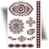 Tatouage éphémère henné bohème avec des motifs inspirés du style oriental, parfait pour une application rapide et un résultat élégant.
