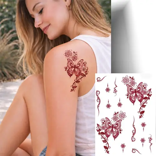 Tatouage temporaire effet henné avec motifs papillon, fleurs et arabesques – application rapide.