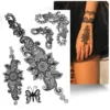 Tatouage éphémère oriental femme avec des motifs noirs fins, rappelant la dentelle et l'effet henné, conçu pour être appliqué sur la main, le poignet ou la cheville.
